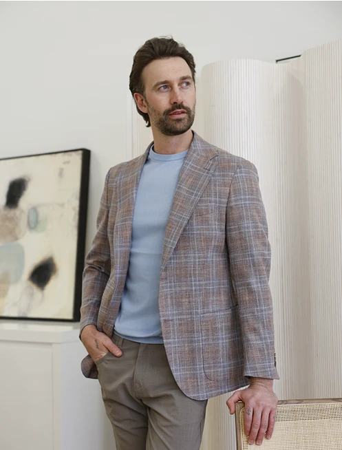 Man posing in a sport coat from Olliver Grey