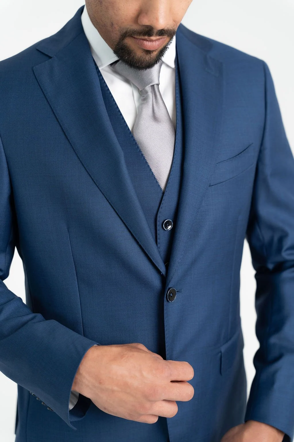 Close-up of Calvaresi steel blue wool-mohair suit separate featuring elegant texture and modern tailoring