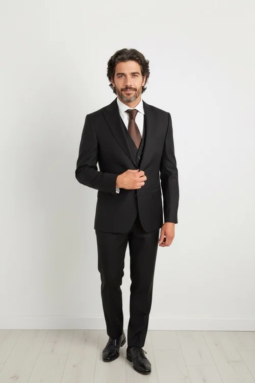 Calvaresi black suit separate crafted from Vitale Barberis Canonico Super 110's wool with tailored fit and year-round versatility
