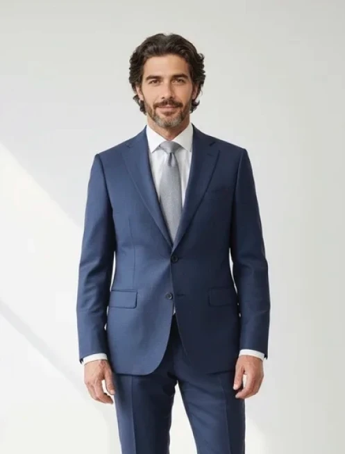 Man in a navy blue suit made by Calvaresi