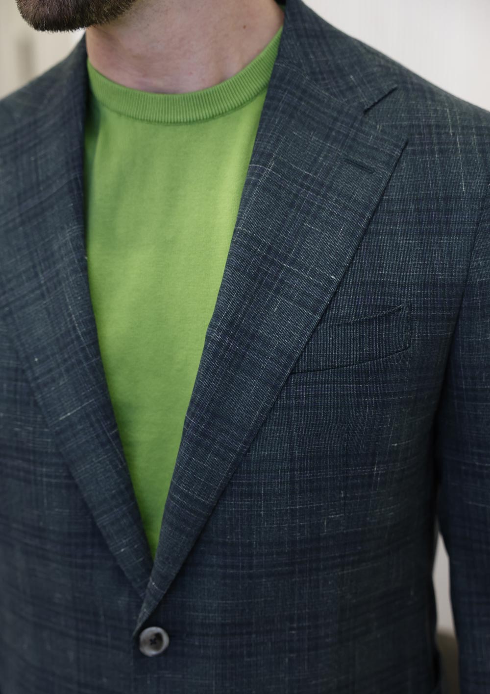 Close-up of Olliver Grey navy textured sport coat fabric and styling details
